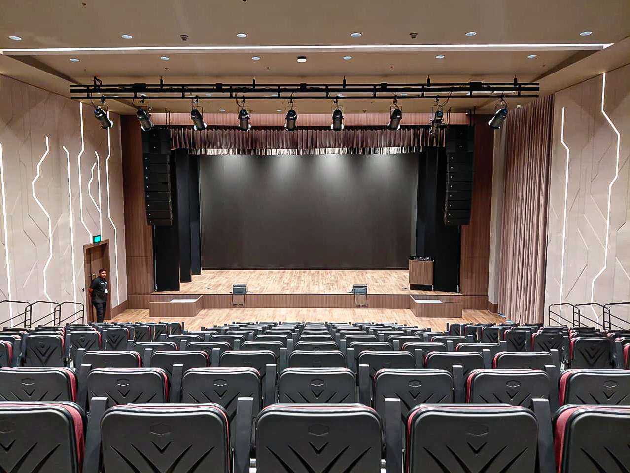 Auditorium with tiered seating and stage